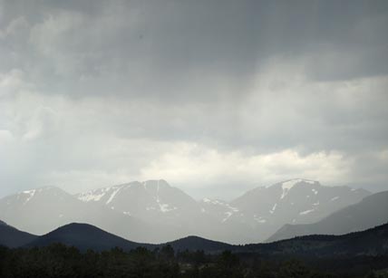 A rainstorm comes over the mountains