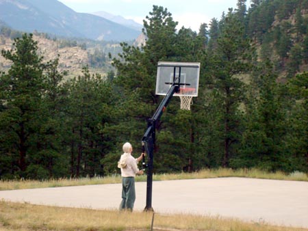 Adjustable basketball hoop