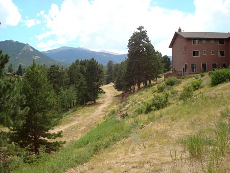 Looking up at Twin Sisters lodge from the trail going to Barclay reunion cabin